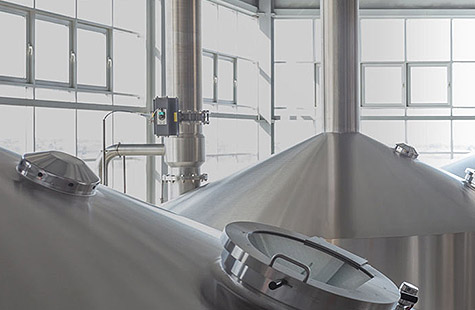 When cleaning manholes, what kind of cleaning agent should be used?